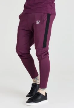 SIKSILKATHLETE - Träningsbyxor - Black/burgundy
