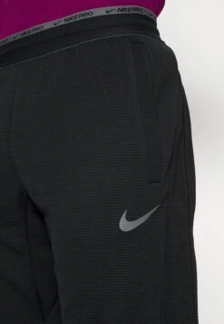 Nike PerformanceTräningsbyxor - Black/iron Grey -Stil och Komfort Butik 4a879255342844f3a69a4820cf8a9a66