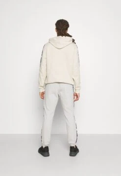 ReebokTAPE - Träningsbyxor - Medium Grey Heather -Stil och Komfort Butik 5074c035819f4a4c978e5498a7a59383