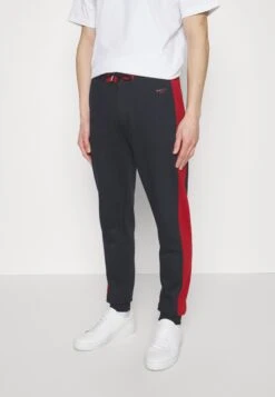 BallyTräningsbyxor - Ink/bally Red 11 BallyTräningsbyxor - Ink/bally Red -Stil och Komfort Butik 7cb8ae67a7b443c3aa328be2dbfc9067