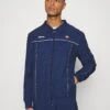 EllesseMAGNIFICO - Träningsjacka - Denim 2 EllesseMAGNIFICO - Träningsjacka - Denim -Stil och Komfort Butik 858e1a40175344adbcaf8e8e17a04431