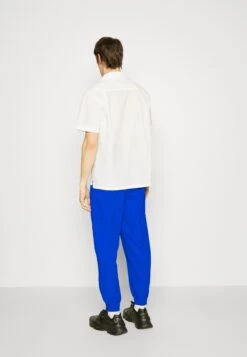7 DAYS ActiveTRACK PANTS UNISEX - Träningsbyxor - Princess Blue -Stil och Komfort Butik 90a04b81cd184ccbaab9059731605b0d