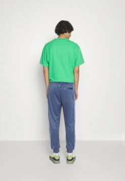 Nike SportswearCLUB PANT - Träningsbyxor - Diffused Blue 12 Nike SportswearCLUB PANT - Träningsbyxor - Diffused Blue -Stil och Komfort Butik a9e097cce0624237b1d23d2e68788c4d