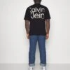 Calvin KleinMATTE BACK LOGO - T-shirt Med Print - Black -Stil och Komfort Butik b18e4c36606540029326cb09e5da394c